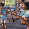 hispanic family fishing in a pier