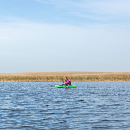 man kayak fishing