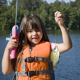 Kid holding fish