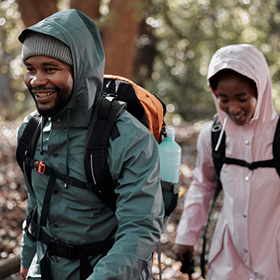 Couple hiking through the woods
